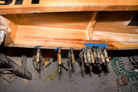 Clamps after vacuum-infusing epoxy.